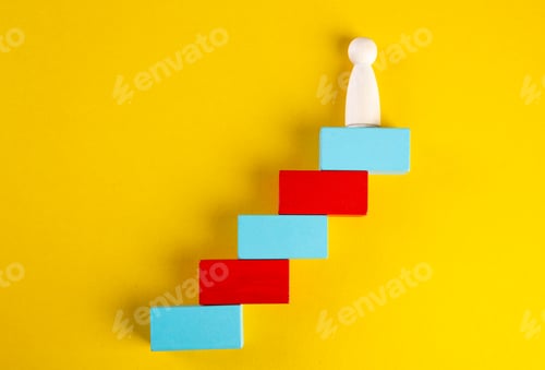 Preview: Concept of supremacy leader. Wooden figures on yellow background