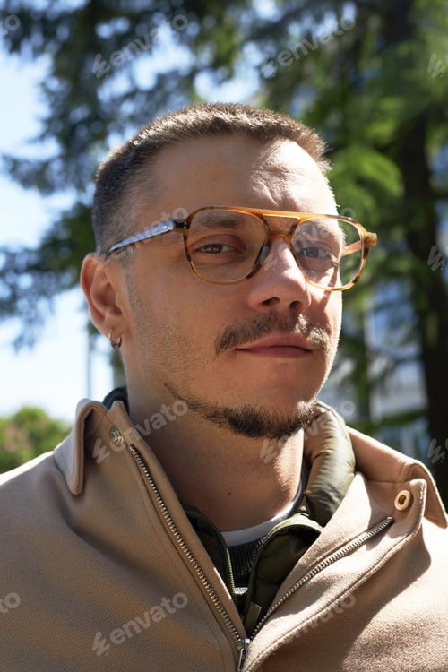 Preview: Young man walking in the park