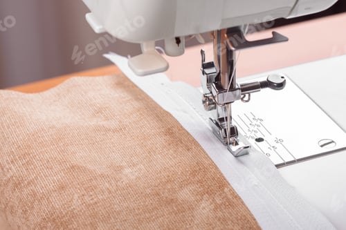Preview: Modern Sewing Machine Special Presser Foot With Beige Fabric And Zipper, Closeup