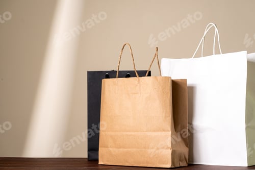 Preview: Colorful Shopping Bags on Wooden Table