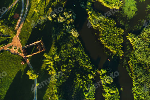 Preview: Top view of the ruins of an old mill in Loshitsky Park in Minsk and the Svisloch river at sunset