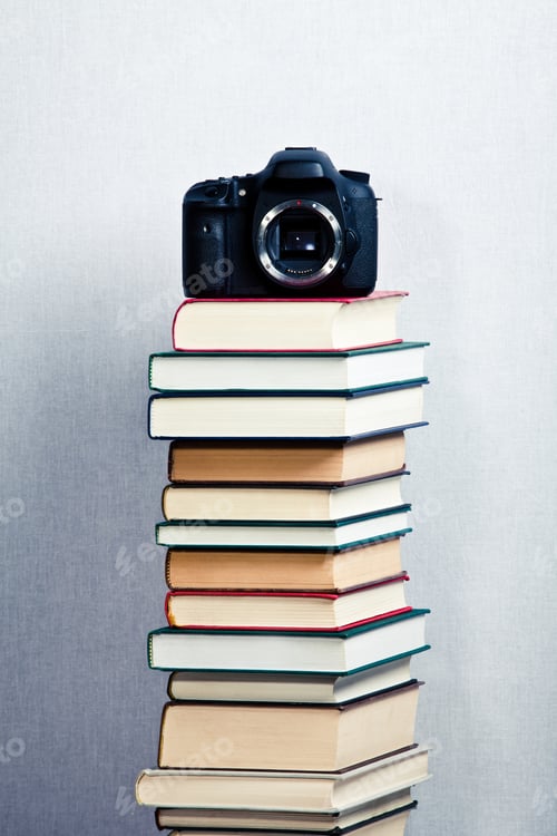 Preview: Camera on a high stack of books