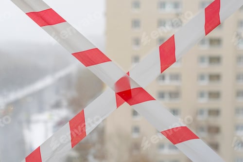 Preview: barrier tape on the window, concept quarantine during coronavirus pandemic in the world