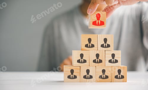 Preview: A red manager icon that stands out distinctively from a group of staff employee icons displayed