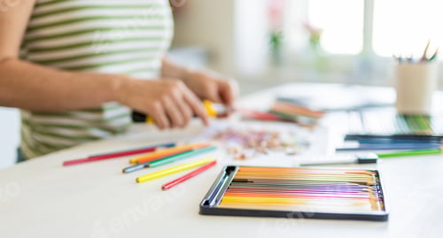 Preview: Woman Sharpening Colored Pencils