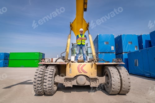 Preview: Engineer worker under working with fork lift container truck is transportation container shipping do
