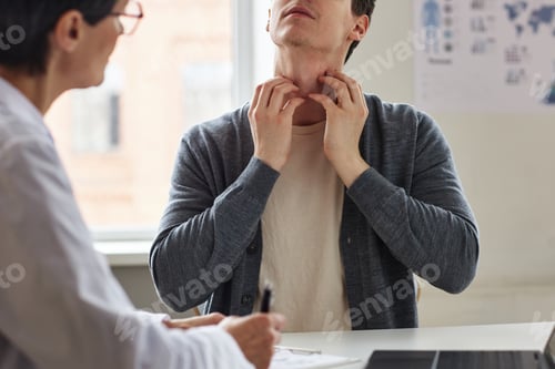 Preview: Close up of man scratching neck allergies or skin condition