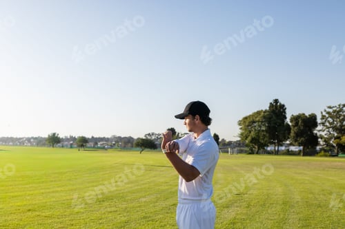 Preview: Male athlete warming up, stretching wrists on sports field, animated overlays highlighting wrists