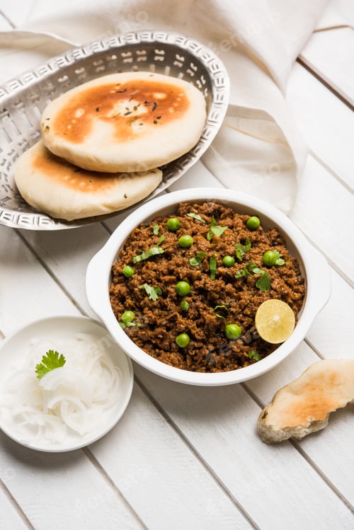 Delicious Ground Meat Dish with Fresh Pita Bread