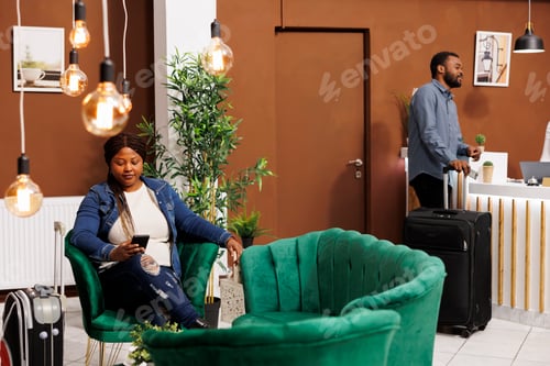 Preview: Hotel guests wait for check-in