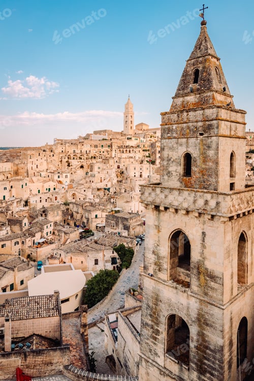 Preview: Sassi di Matera from the Belvedere di San Pietro Barisano, blue sky with clouds, vertical