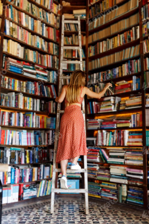 Preview: Young woman in bookstore