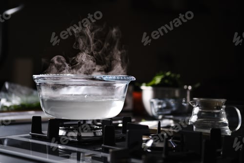 Preview: Hot water in pot on gas stove