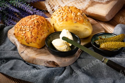 Preview: Tasty buns with cheese and sunflower seeds.