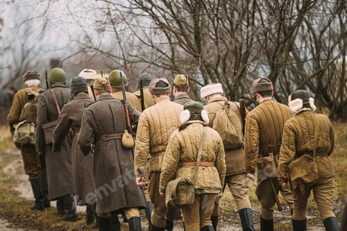 Preview: Re-enactors Dressed As World War II Russian Soviet Red Army Soldiers Marching Through Forest