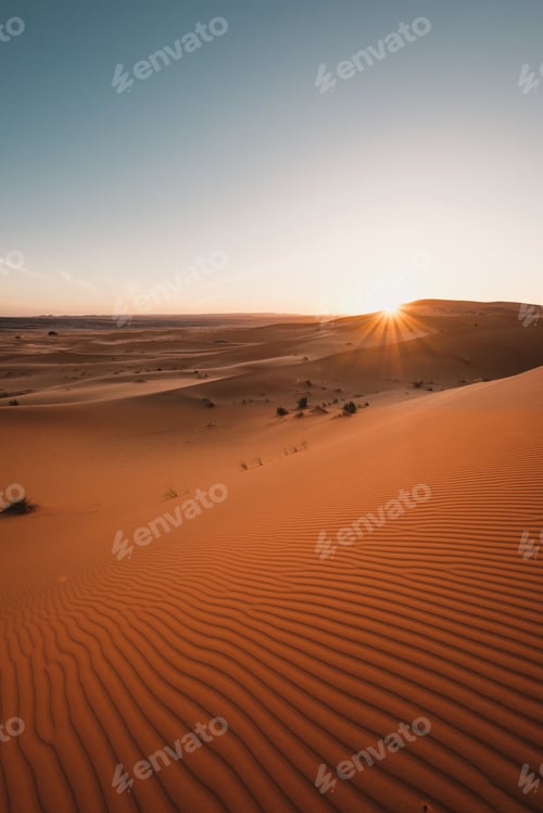 Preview: Vertical shot of the breathtaking desert under the blue sky captured in Morocco