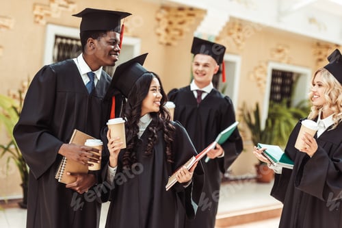 Preview: group of graduated multiethnic students spending time together