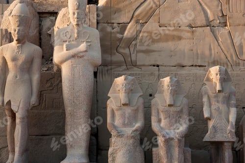Preview: Row of ancient Egyptian stone sculptures of Pharaohs.