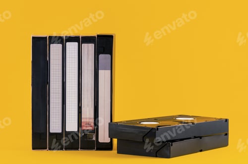 Preview: Old audio tapes on a yellow background