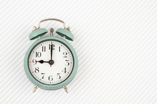 Preview: Flat lay with vintage alarm clock over the pastel background