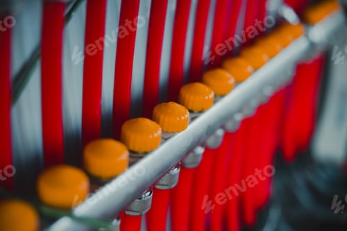Preview: Underfloor heating manifold distributing hot water through red pipes