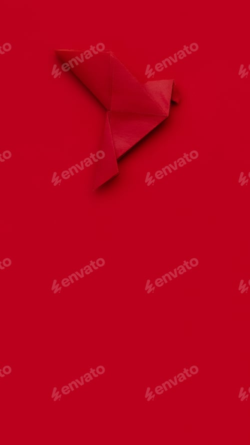 Preview: red paper origami pigeon on red background, minimalism, vertcal, 16 :9