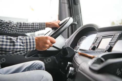 Preview: Truck drivers big truck of driver's hands on big truck steering wheel