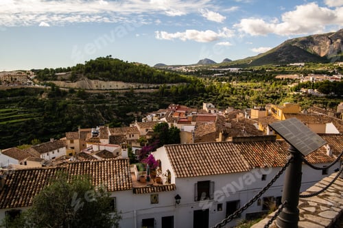 Preview: Bird's eye view of a beautiful city of Polop in Spain with mountains in the background