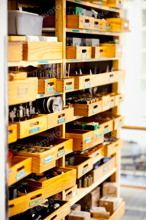 Preview: Spare parts in wooden drawers at industry