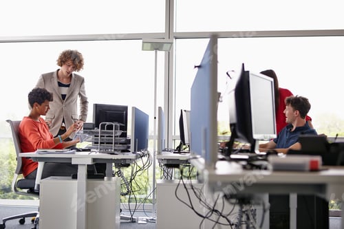Preview: Colleagues in open-plan office