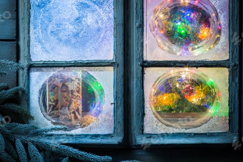 Preview: Beautiful cookies in jar for Christmas in frozen window