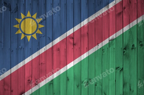 Preview: Namibia flag depicted in bright paint colors on old wooden wall close up