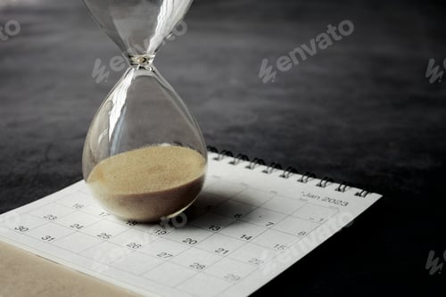 Preview: hourglass on a calendar, and flowing through the bulb of sandglass