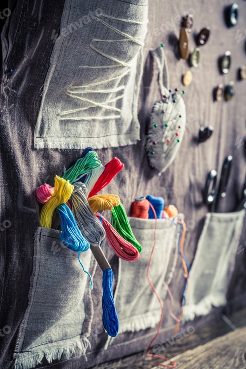 Preview: Handmade sewing mat with scissors, threads and needles in tailor workshop