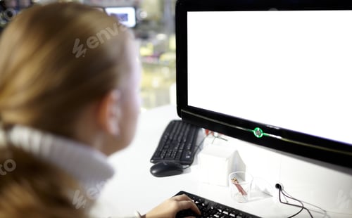 Preview: Woman Works at Computer in Bright Office Setting