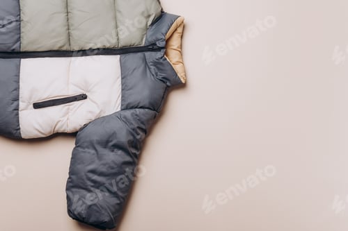 Preview: Fashion baby colorblock puffer jacket. Newborn beige clothes outfit. Winter, autumn collection