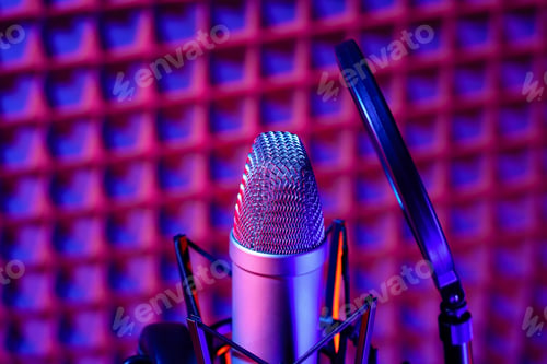 Preview: Professional studio microphone against acoustic foam panel background in neon light