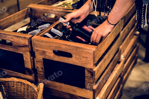 Preview: People Hands Getting Bottle of Red Wine