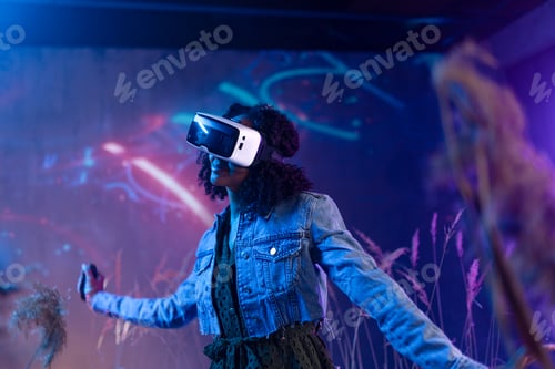 Preview: Metaverse digital cyber world technology, woman with virtual reality VR goggles playing augmented