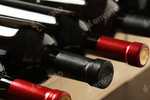 Preview: Bottles of different wines, closeup. Expensive collection