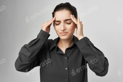 Preview: woman in black shirt headache discontent trouble isolated background