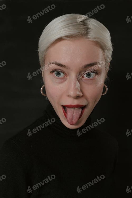 Preview: Beautiful Emotional Girl With White Hair On A Black Background