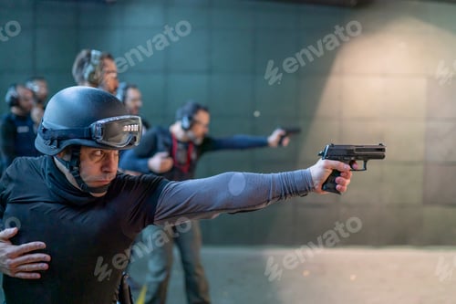 Preview: Police training in shooting gallery with short weapon.