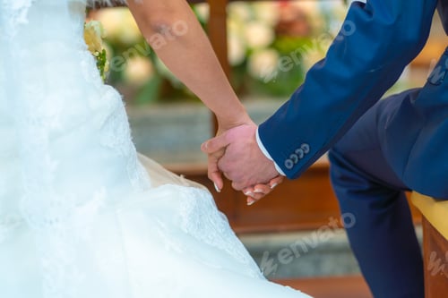 Preview: Detail of hands at the wedding of the happy bride and groom, marriage portraits