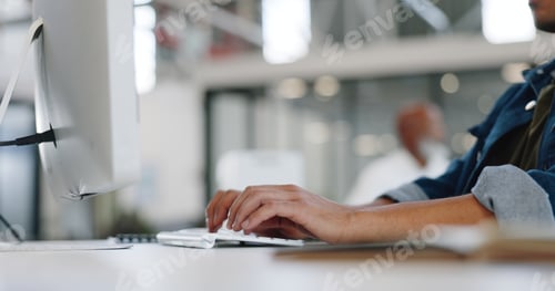 Preview: Hands, typing and computer with a business man at work on a report, project or deadline in his offi