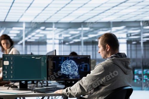 Preview: Server room employee building large language model AI program
