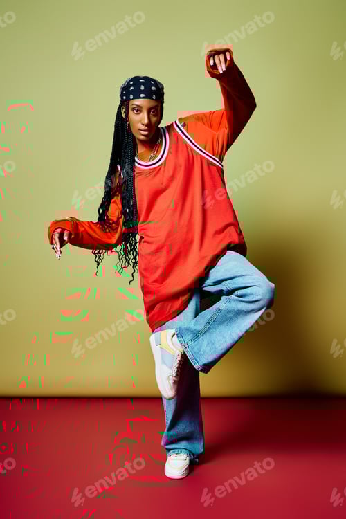 Preview: A young woman showcases her fashion sense with confidence, standing on one leg in a trendy outfit.