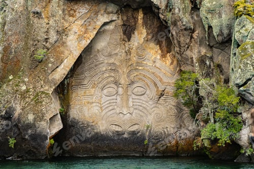 Preview: View of Mine Bay Maori Rock Carvings by the water