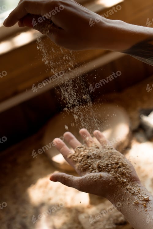 Preview: Hads with sawdust