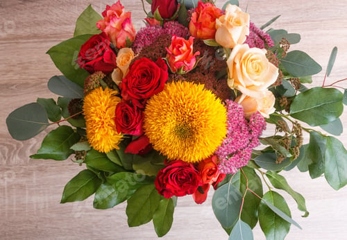 Preview: bouquet of sunflowers and roses